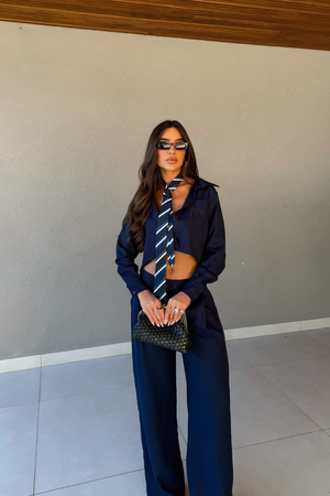 Conjunto feminino camisa cropped e calça wide leg off white — Riviera Náurea